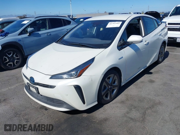 2020 Toyota Prius L Eco with VIN JTDKARFUXL3107211, listed as a IAAI auction lot 42797561 with 328,023 mi miles and . Bid and sale history available at DreamBid. Image 2.