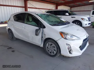 2016 Toyota Prius c One with VIN JTDKDTB37G1136023, listed as a IAAI auction lot 41272824 with 174,051 mi miles. Bid and sale history available at carsss.com. Image 1.