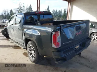 2015 GMC Canyon 2WD SLE with VIN 1GTG5BE37F1265497, listed as a IAAI auction lot 41507236 with 101,385 mi miles. Bid and sale history available at carsss.com. Image 3.