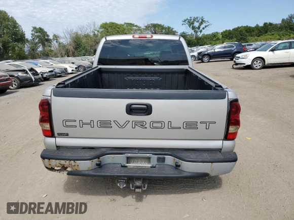 2005 Chevrolet Silverado 1500 with VIN 1GCEK19V35E189838, listed as a Copart auction lot 67651894 with 69,679 mi miles and Salvage Title. Bid and sale history available at carsss.com. Image 6.