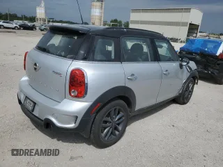 2014 MINI Countryman S with VIN WMWZC5C55EWM18087, listed as a Copart auction lot 68661614 with Not provided miles and Salvage title. Bid and sale history available at DreamBid. Image 3.