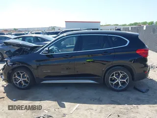 2017 BMW X1 sDrive28i z VIN WBXHU7C31H5H33748, wystawiony jako IAAI lot #42003198 z przebiegiem 71 274 mil mil oraz . Historia ofert i sprzedaży dostępna na DreamBid. Obrazek 14.
