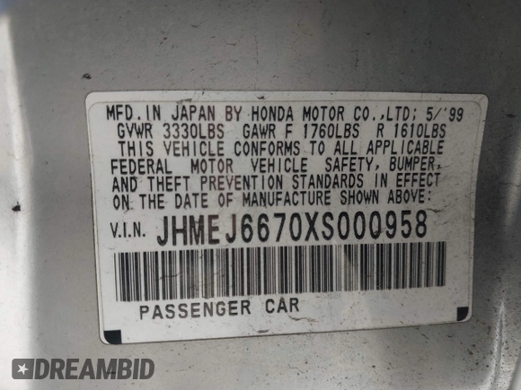 1999 Honda Civic LX with VIN JHMEJ6670XS000958, listed as a IAAI auction lot 41620949 with 93,698 mi miles and . Bid and sale history available at DreamBid. Image 9.