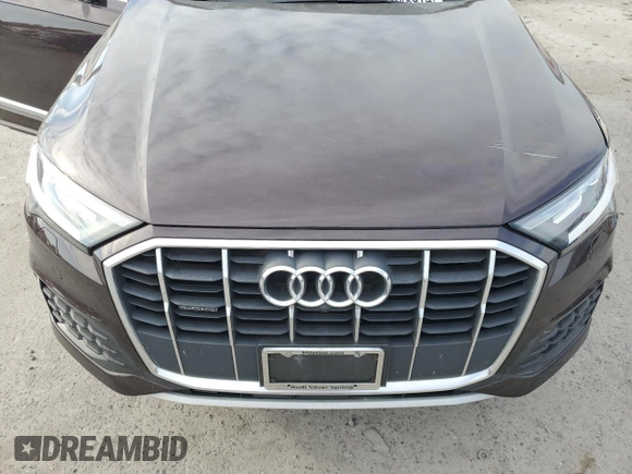 2020 Audi Q7 Premium z VIN WA1AXAF73LD006991, wystawiony jako Copart lot #75948974 z przebiegiem Nie podano mil oraz Szkoda całkowita • Salvage title. Historia ofert i sprzedaży dostępna na DreamBid. Obrazek 12.