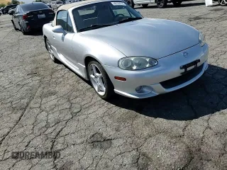 2003 Mazda MX-5 Miata Cloth z VIN JM1NB353430301685, wystawiony jako Copart lot #48756715 z przebiegiem 57 414 mil mil oraz Szkoda całkowita • Salvage title. Historia ofert i sprzedaży dostępna na DreamBid. Obrazek 10.