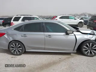 2023 Honda Civic EX with VIN 2HGFE1F77PH321210, listed as a IAAI auction lot 41797011 with 8,748 mi miles and . Bid and sale history available at DreamBid. Image 13.