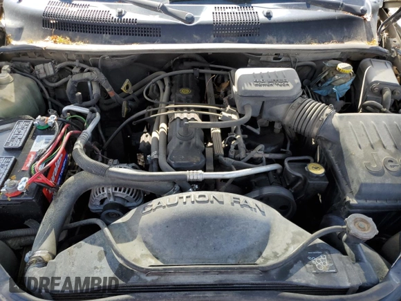 2000 Jeep Grand Cherokee Laredo with VIN 1J4GW48S6YC304447, listed as a Copart auction lot 58001035 with Not provided miles and Clean title. Bid and sale history available at DreamBid. Image 11.