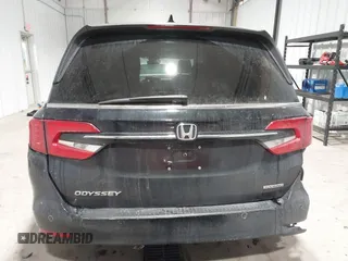 2023 Honda Odyssey Touring z VIN 5FNRL6H85PB039450, wystawiony jako IAAI lot #41504351 z przebiegiem 51 000 mil mil oraz . Historia ofert i sprzedaży dostępna na DreamBid. Obrazek 16.