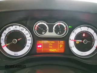 2014 FIAT 500L Easy с VIN ZFBCFABH6EZ024863, выставлен на аукционе Copart как лот 65282035 с пробегом 99 407 миль миль и Чистый • Clean title. История ставок и продаж доступна на DreamBid. Изображение 9.