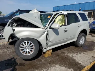 2009 Mercury Mariner Premier z VIN 4M2CU87GX9KJ25554, wystawiony jako Copart lot #59949775 z przebiegiem Nie podano mil oraz Szkoda całkowita • Salvage title. Historia ofert i sprzedaży dostępna na DreamBid. Obrazek 1.
