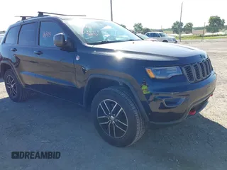2017 Jeep Grand Cherokee Trailhawk with VIN 1C4RJFLG5HC841869, listed as a IAAI auction lot 42296985 with 103,275 mi miles and . Bid and sale history available at DreamBid. Image 1.