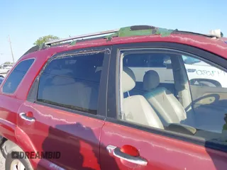 2005 Kia Sportage LX with VIN KNDJF723457078461, listed as a IAAI auction lot 41948080 with 104,330 mi miles and . Bid and sale history available at carsss.com. Image 13.