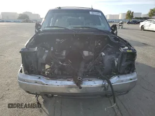 2004 GMC Yukon SLE with VIN 1GKEK13T24J206310, listed as a Copart auction lot 45712405 with 0 mi miles and Salvage Title. Bid and sale history available at carsss.com. Image 5.