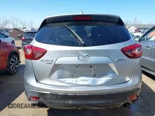 2016 Mazda CX-5 Grand Touring with VIN JM3KE4DY9G0795360, listed as a IAAI auction lot 41933991 with 176,373 mi miles. Bid and sale history available at carsss.com. Image 16.