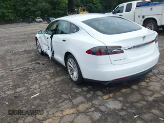 2016 Tesla Model S 70 with VIN 5YJSA1E11GF132984, listed as a IAAI auction lot 42428634 with Not provided miles and . Bid and sale history available at DreamBid. Image 3.