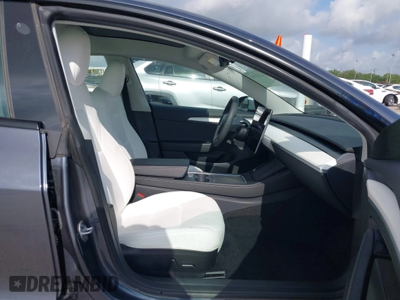 2023 Tesla Model 3 with VIN 5YJ3E1EA7PF567906, listed as a IAAI auction lot 42280993 with 41,452 mi miles and . Bid and sale history available at DreamBid. Image 5.