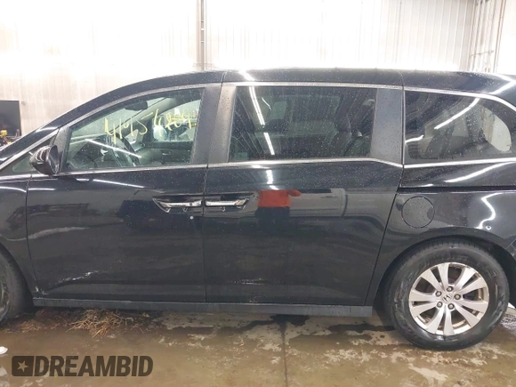 2015 Honda Odyssey EX-L with VIN 5FNRL5H6XFB019430, listed as a IAAI auction lot 41954209 with 161,389 mi miles and . Bid and sale history available at DreamBid. Image 14.