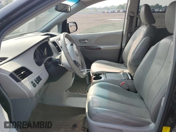2013 Toyota Sienna XLE AAS with VIN 5TDYK3DCXDS333750, listed as a Copart auction lot 60894295 with 154,400 mi miles and Salvage title. Bid and sale history available at DreamBid. Image 7.