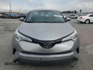 2018 Toyota C-HR XLE z VIN NMTKHMBX3JR023403, wystawiony jako Copart lot #54574245 z przebiegiem 119 657 mil mil oraz Szkoda całkowita • Salvage title. Historia ofert i sprzedaży dostępna na DreamBid. Obrazek 5.