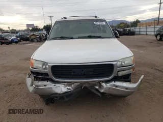 2003 GMC Yukon SLE with VIN 1GKEK13T43R205384, listed as a Copart auction lot 76916664 with 258,551 mi miles and Salvage Title. Bid and sale history available at carsss.com. Image 5.