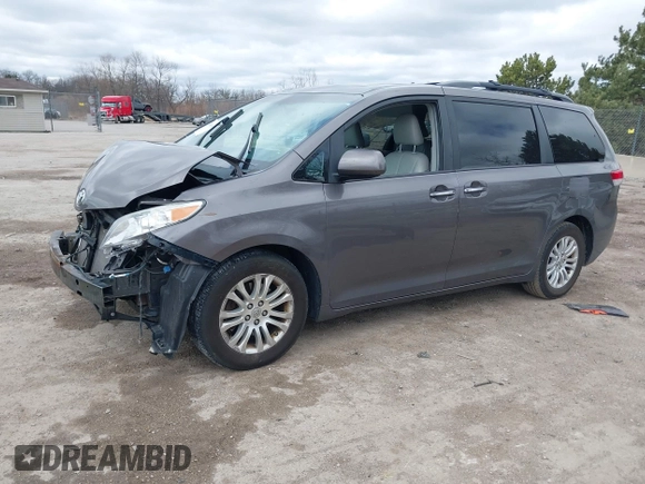 2014 Toyota Sienna XLE with VIN 5TDYK3DC0ES422700, listed as a IAAI auction lot 42049181 with 147,498 mi miles. Bid and sale history available at carsss.com. Image 17.