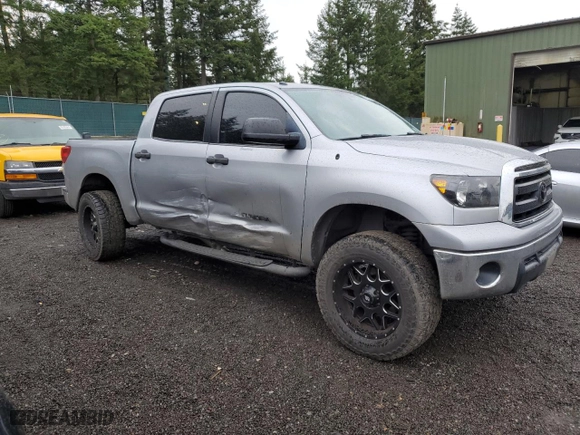 2013 Toyota Tundra 4WD Truck with VIN 5TFDM5F19DX047348, listed as a Copart auction lot 85330014 with 128,205 mi miles and Salvage Title. Bid and sale history available at carsss.com. Image 4.
