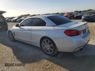 2014 BMW 4 Series 428i with VIN WBA3V7C54EJ872582, listed as a Copart auction lot 49071974 with 104,391 mi miles and Clean title. Bid and sale history available at DreamBid. Image 2.
