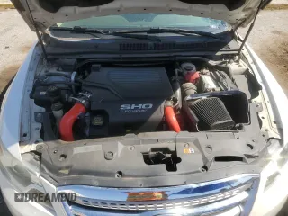 2010 Ford Taurus SHO z VIN 1FAHP2KT6AG105528, wystawiony jako Copart lot #61943515 z przebiegiem 110 544 mil mil oraz Czysty tytuł • Clean title. Historia ofert i sprzedaży dostępna na DreamBid. Obrazek 11.