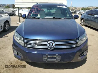 2015 Volkswagen Tiguan SE with VIN WVGAV7AX2FW094359, listed as a Copart auction lot 60101885 with 106,305 mi miles and Salvage title. Bid and sale history available at DreamBid. Image 5.