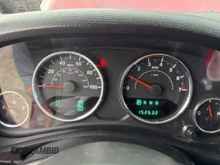 2012 Jeep Wrangler Unlimited Sport with VIN 1C4BJWDG5CL289329, listed as a Copart auction lot 65816775 with 152,632 mi miles and Clean title. Bid and sale history available at DreamBid. Image 8.