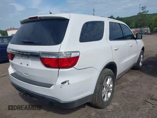 2013 Dodge Durango SXT with VIN 1C4RDJAG4DC512491, listed as a IAAI auction lot 42276406 with 219,766 mi miles and . Bid and sale history available at DreamBid. Image 4.