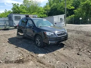 2018 Subaru Forester Touring z VIN JF2SJAWC5JH590150, wystawiony jako Copart lot #57391515 z przebiegiem 61 301 mil mil oraz Szkoda całkowita • Salvage title. Historia ofert i sprzedaży dostępna na DreamBid. Obrazek 14.