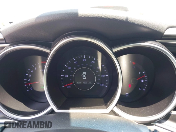 2015 Kia Optima LX with VIN 5XXGM4A78FG441226, listed as a IAAI auction lot 42576517 with 166,212 mi miles and . Bid and sale history available at DreamBid. Image 7.
