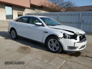 2016 Ford Taurus SEL with VIN 1FAHP2H89GG122884, listed as a Copart auction lot 53597595 with 128,627 mi miles and Salvage title. Bid and sale history available at DreamBid. Image 4.