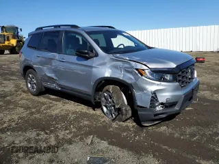 2022 Honda Passport TrailSport z VIN 5FNYF8H61NB026883, wystawiony jako Copart lot #49298085 z przebiegiem 18 600 mil mil oraz Szkoda całkowita • Salvage title. Historia ofert i sprzedaży dostępna na DreamBid. Obrazek 4.