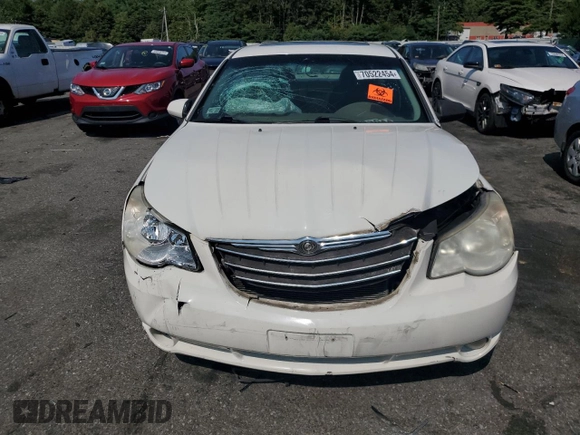 2009 Chrysler Sebring Limited with VIN 1C3LC56V39N566582, listed as a Copart auction lot 70522454 with 148,113 mi miles and Salvage title. Bid and sale history available at DreamBid. Image 5.
