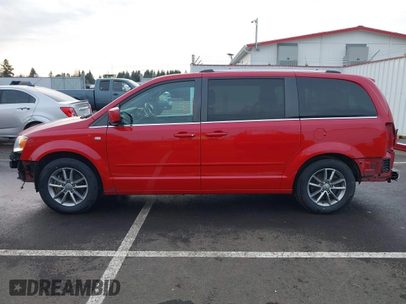 2014 Dodge Grand Caravan SXT with VIN 2C4RDGCG3ER257695, listed as a IAAI auction lot 41534568 with 116,896 mi miles and . Bid and sale history available at DreamBid. Image 15.