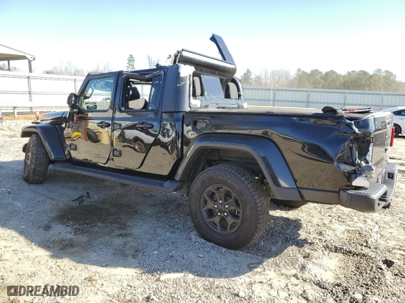 2022 Jeep Gladiator Willys with VIN 1C6JJTAM7NL179932, listed as a Copart auction lot 42287785 with 30,211 mi miles and Salvage Title. Bid and sale history available at carsss.com. Image 2.