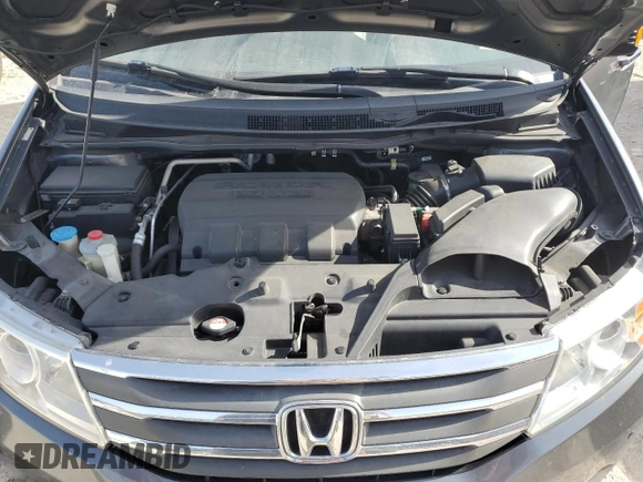 2012 Honda Odyssey Touring with VIN 5FNRL5H96CB122785, listed as a Copart auction lot 84459954 with 114,208 mi miles and Salvage Title. Bid and sale history available at carsss.com. Image 12.