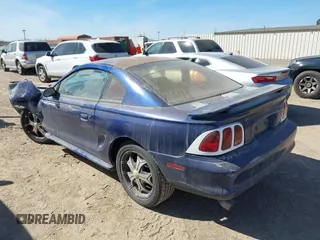 1996 Ford Mustang with VIN 1FALP4044TF223135, listed as a IAAI auction lot 41390359 with 199,143 mi miles. Bid and sale history available at carsss.com. Image 3.