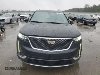 2021 Cadillac XT6 Premium Luxury z VIN 1GYKPDRS3MZ117552, wystawiony jako Copart lot #46487165 z przebiegiem 50 349 mil mil oraz Tytuł czysty. Historia ofert i sprzedaży dostępna na DreamBid. Obrazek 5.