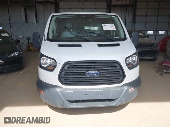 2018 Ford Transit with VIN 1FTYR2YM9JKA09684, listed as a IAAI auction lot 41713012 with 130,310 mi miles and . Bid and sale history available at DreamBid. Image 12.