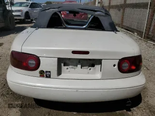 1990 Mazda MX-5 Miata z VIN JM1NA3511L0106323, wystawiony jako Copart lot #50449685 z przebiegiem 179 018 mil mil oraz Szkoda całkowita • Salvage title. Historia ofert i sprzedaży dostępna na DreamBid. Obrazek 6.