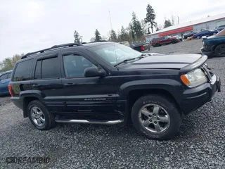 2004 Jeep Grand Cherokee Limited with VIN 1J8GW58N04C186548, listed as a IAAI auction lot 41949015 with 244,505 mi miles. Bid and sale history available at carsss.com. Image 14.