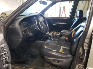 1997 Jeep Grand Cherokee Laredo with VIN 1J4GZ58Y7VC650813, listed as a Copart auction lot 41486724 with 266,004 mi miles and Salvage Title. Bid and sale history available at carsss.com. Image 7.