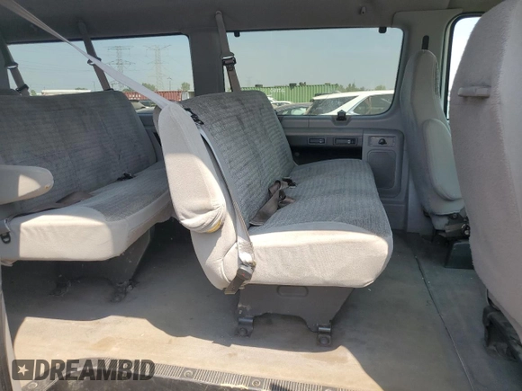 2002 Ford Econoline Passenger XL with VIN 1FBSS31L52HB63264, listed as a Copart auction lot 65820305 with 196,865 mi miles and Clean title. Bid and sale history available at DreamBid. Image 11.