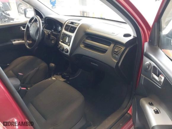 2009 Kia Sportage LX with VIN KNDJE723597600071, listed as a IAAI auction lot 41859059 with 135,760 mi miles. Bid and sale history available at carsss.com. Image 5.
