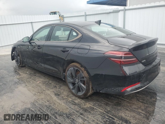 2023 Genesis G70 2.0T with VIN KMTG34TA0PU120533, listed as a Copart auction lot 73781104 with 26,932 mi miles and Clean Title. Bid and sale history available at carsss.com. Image 2.