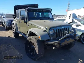 2016 Jeep Wrangler Unlimited Sport z VIN 1C4BJWDG6GL116747, wystawiony jako IAAI lot #42447344 z przebiegiem 142 195 mil mil oraz . Historia ofert i sprzedaży dostępna na DreamBid. Obrazek 1.