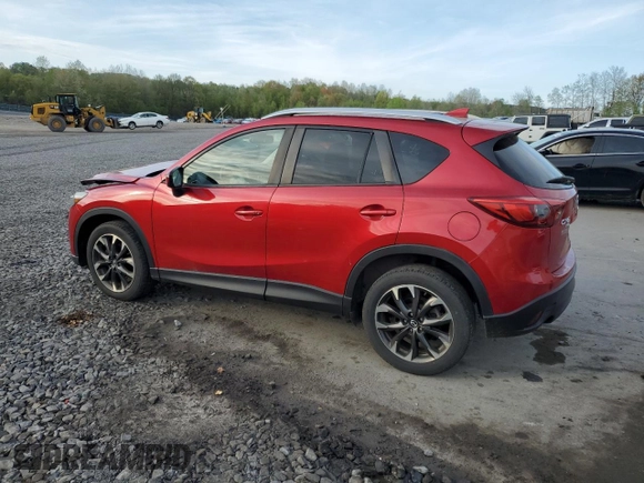 2016 Mazda CX-5 Grand Touring with VIN JM3KE4DY6G0753826, listed as a Copart auction lot 55391555 with 96,852 mi miles and Salvage Title. Bid and sale history available at DreamBid. Image 2.